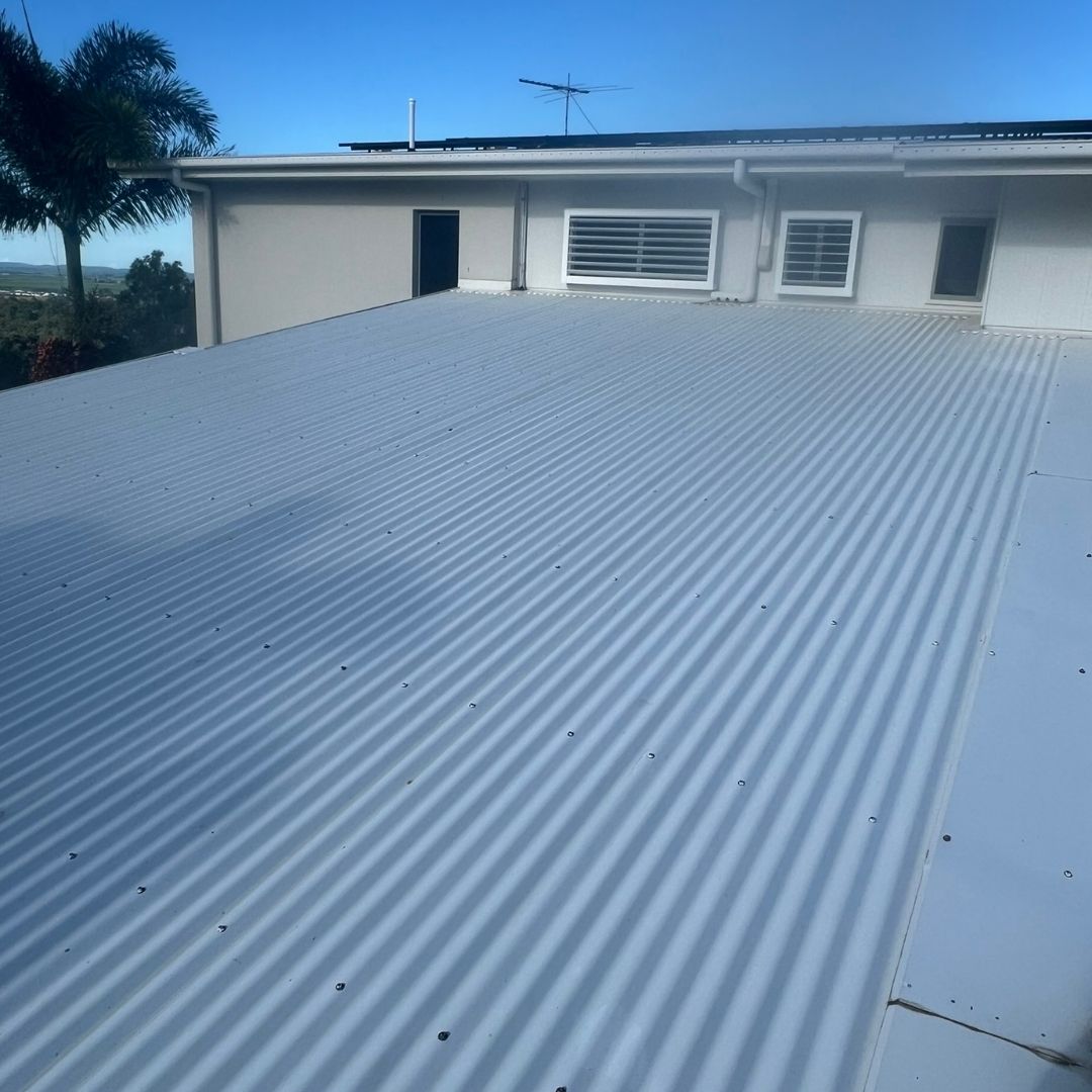 Roof cleaning on a Gold Coast property - soft wash treatment for tile and Colorbond roofs