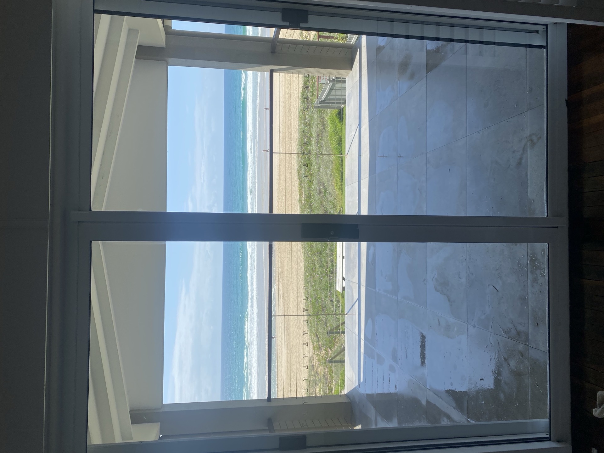 Crystal clear beachfront windows with unobstructed ocean views on Gold Coast property