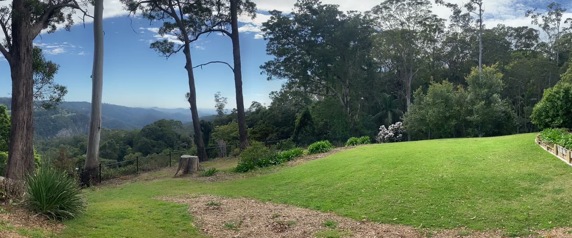 Panoramic sweep across a Tamborine Mountain property, from the escarpment view to the house
